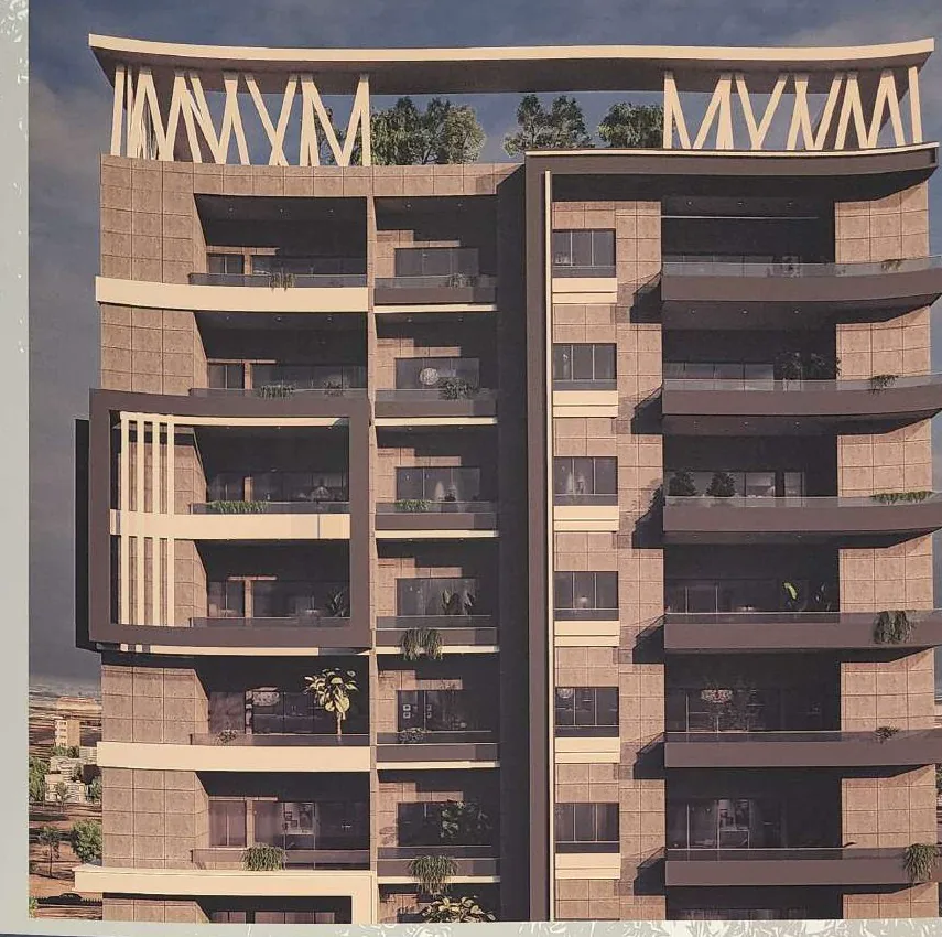 Facade of Petal Index Residency, the tower 99 Real Estate is currently marketing in Gulshan-e-Iqbal